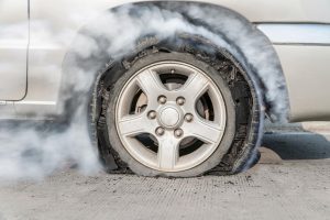 Is it dangerous to drive with a flat tire?