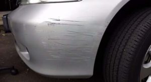 How do I remove light scratches on my white car?